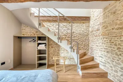 Un ou plusieurs lits dans un hébergement de l'établissement le Clos Doré