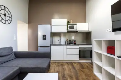 Cuisine ou kitchenette dans l'établissement Smartstay Louis Mille - Gratte-Ciel
