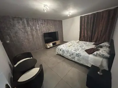 Un ou plusieurs lits dans un hébergement de l'établissement Belle Maison dans le Beaujolais
