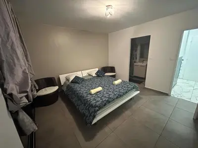 Un ou plusieurs lits dans un hébergement de l'établissement Belle Maison dans le Beaujolais