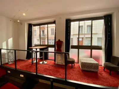 Un ou plusieurs lits dans un hébergement de l'établissement LE LOFT des Charmettes