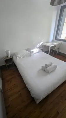 Un ou plusieurs lits dans un hébergement de l'établissement Chambre double chez l'habitant Oullins