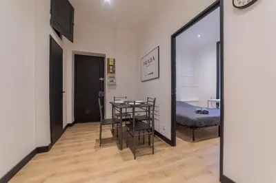 Un ou plusieurs lits dans un hébergement de l'établissement Royal Suite - Villeurbanne centre