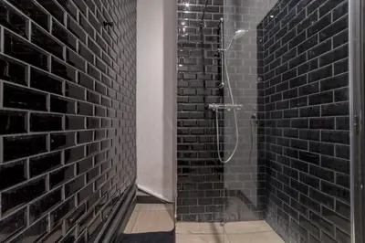 Salle de bains dans l'établissement Royal Suite - Villeurbanne centre