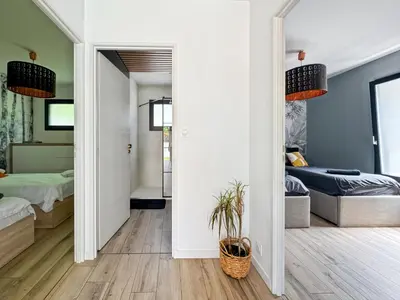 Un ou plusieurs lits dans un hébergement de l'établissement Modern 2 bedroom house, sleeps up to 6