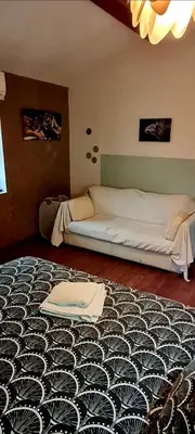 Un ou plusieurs lits dans un hébergement de l'établissement Chambre d hôtes
