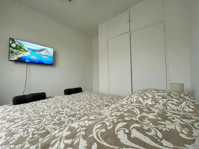 Télévision ou salle de divertissement dans l'établissement Superbe T2 à 15 min de Lyon