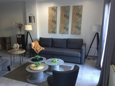 Coin salon dans l'établissement LES GITES CHEROIS maison esprit campagne 6 personnes