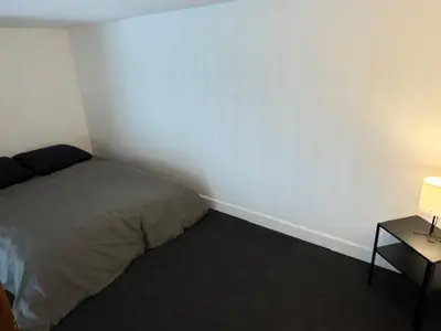 Un ou plusieurs lits dans un hébergement de l'établissement OULLINS T3 COSY 70M2 - 6 Pers 2 Chambre - 2 Mezzanines Métro & centre à Pied