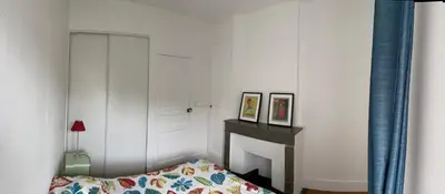 Un ou plusieurs lits dans un hébergement de l'établissement Appartement collonges bord de Saône