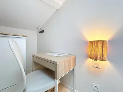 Un ou plusieurs lits dans un hébergement de l'établissement Les Vignes 3 Chambres avec Salle de bain privative