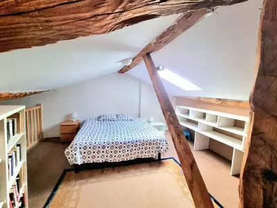 Un ou plusieurs lits dans un hébergement de l'établissement Le Clos des Jardiniers 1