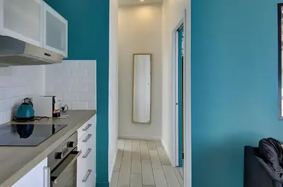 Cuisine ou kitchenette dans l'établissement Saint Genevieve Chic