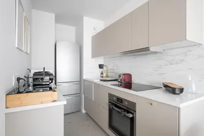 Cuisine ou kitchenette dans l'établissement Asirem - Pied de métro dans le 7ème