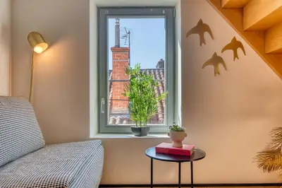 Coin salon dans l'établissement L'Observatoire - Appart au coeur de Lyon - Métros A et C