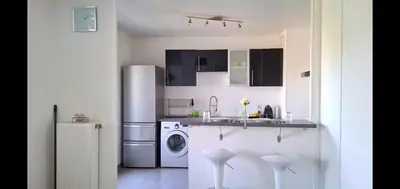 Cuisine ou kitchenette dans l'établissement Perle centre ville