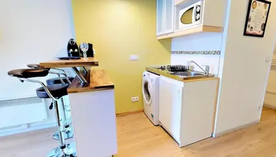 Cuisine ou kitchenette dans l'établissement Grange Blanche 1