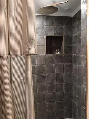 Salle de bains dans l'établissement L'Armandine