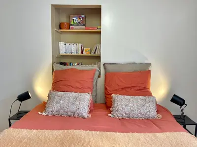 Un ou plusieurs lits dans un hébergement de l'établissement Slow Mood - L'appartement signature