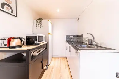 Cuisine ou kitchenette dans l'établissement Le Cosmo - Cosy appart 2 pers-Brotteaux-Métro B