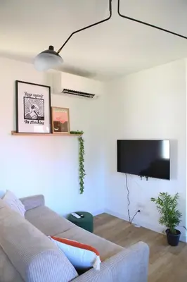 Télévision ou salle de divertissement dans l'établissement Appartement T2 cosy
