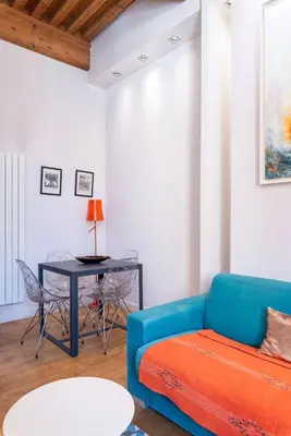 Coin salon dans l'établissement Appartement cosy plein centre - l'Annexe