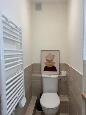 Salle de bains dans l'établissement Appt Ideal groupes, prox Eurexpo