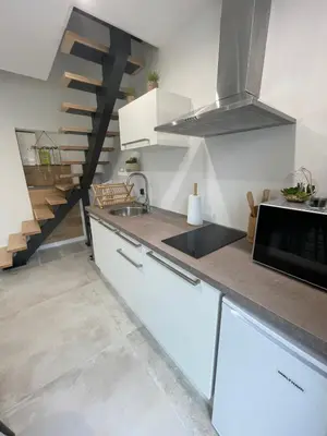 Cuisine ou kitchenette dans l'établissement T2, Aéroport, CNPE, UFPI, RTE