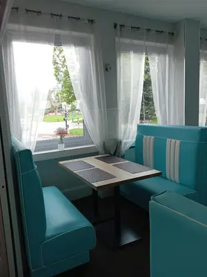 Coin salon dans l'établissement Les nouveaux Ambassadeurs