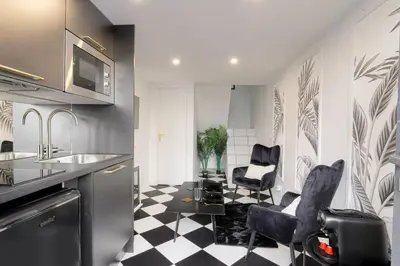 Cuisine ou kitchenette dans l'établissement Cosy et Design duplex Brotteaux - Masséna