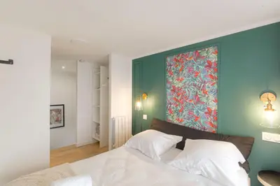 Un ou plusieurs lits dans un hébergement de l'établissement Cosy et Design duplex Brotteaux - Masséna