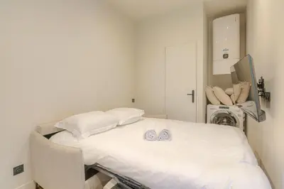 Un ou plusieurs lits dans un hébergement de l'établissement Appartement moderne et confortable , Ecully