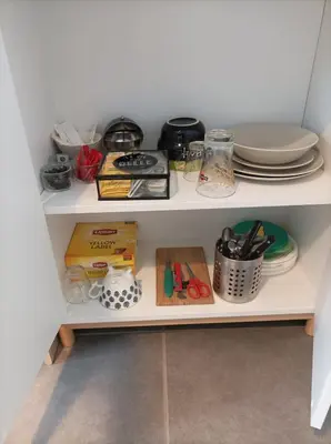 Cuisine ou kitchenette dans l'établissement Chambre salle de bain clim