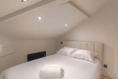 Un ou plusieurs lits dans un hébergement de l'établissement Appartement contemporain au calme, Ecully