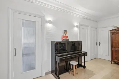 Télévision ou salle de divertissement dans l'établissement Magnifique appartement au cœur du 6ème