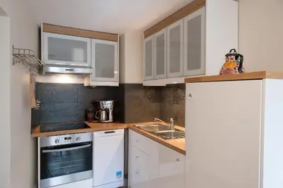 Cuisine ou kitchenette dans l'établissement La Maison Debourg