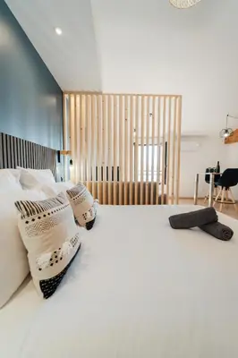 Un ou plusieurs lits dans un hébergement de l'établissement Vina Rhona - Loft de charme entre Rhône et Vignes