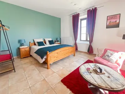 Un ou plusieurs lits dans un hébergement de l'établissement Appartement à la campagne
