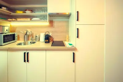 Cuisine ou kitchenette dans l'établissement Charming studio at Jean - Quartier des Cordeliers