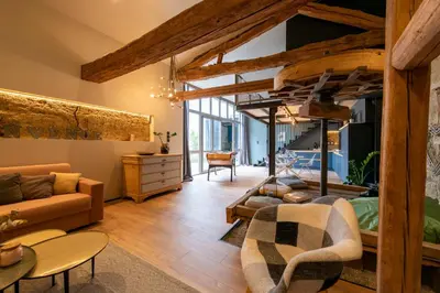 Coin salon dans l'établissement La grange moderne aux portes de Lyon