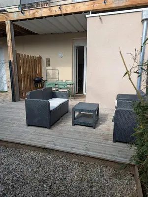 Coin salon dans l'établissement Le petit cocon de Montrond