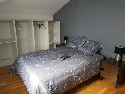 Un ou plusieurs lits dans un hébergement de l'établissement Duplex cosy - 3 chambres avec garage, balcon et clim