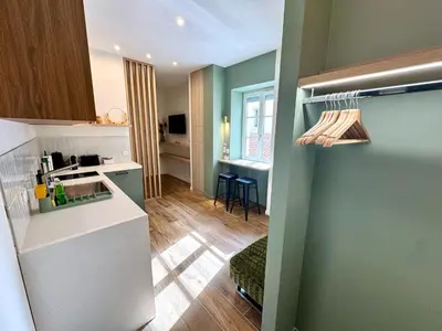 Cuisine ou kitchenette dans l'établissement L'Écrin de Duguesclin Comfort & Charm in Lyon 3rd arrondissement