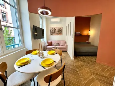 Un ou plusieurs lits dans un hébergement de l'établissement Lumiere - Chic cocoon au coeur de lyon