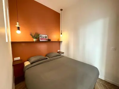 Un ou plusieurs lits dans un hébergement de l'établissement Lumiere - Chic cocoon au coeur de lyon