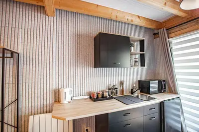 Cuisine ou kitchenette dans l'établissement Ambiance Bois & Charme Proche Lyon