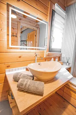 Salle de bains dans l'établissement Ambiance Bois & Charme Proche Lyon