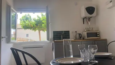 Cuisine ou kitchenette dans l'établissement Petite pause à la Viarhona