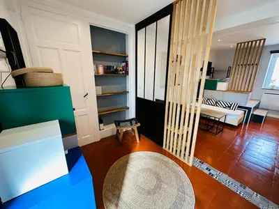 Un ou plusieurs lits dans un hébergement de l'établissement Chez Auguste - charmant studio 3 étoiles