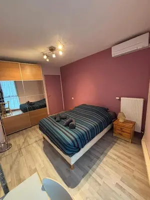 Un ou plusieurs lits dans un hébergement de l'établissement 2 bedrooms, air conditioning, garage, metro